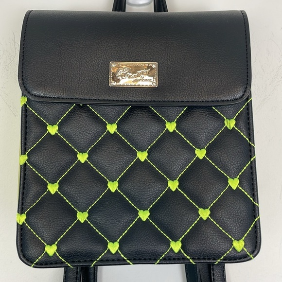 Luv Betsey Johnson Small Black with Lime Green Hearts
Backpack Purse. - Picture 2 of 10